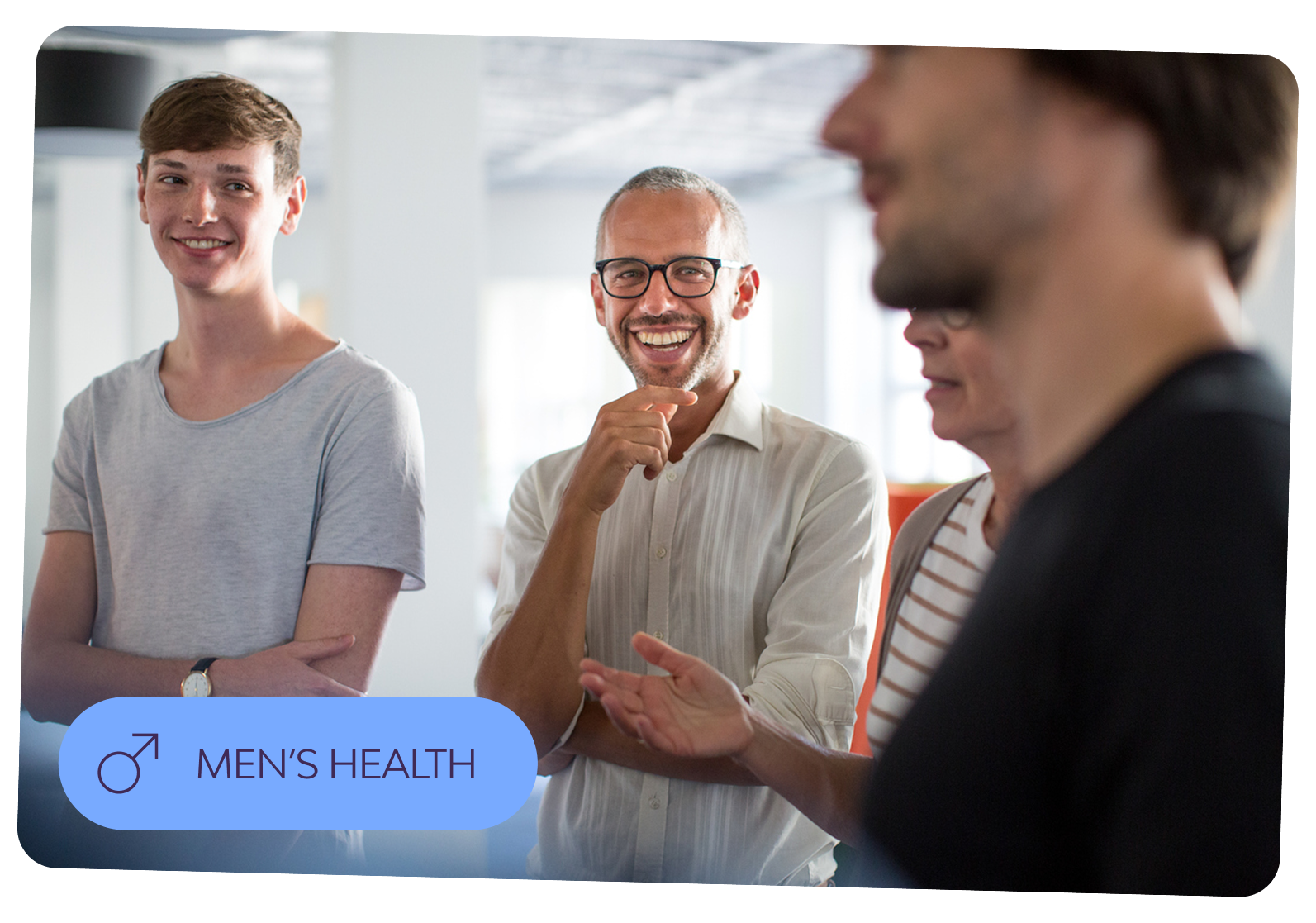 a group of men and women of various ages, close up, they are looking at each other smiling, work setting