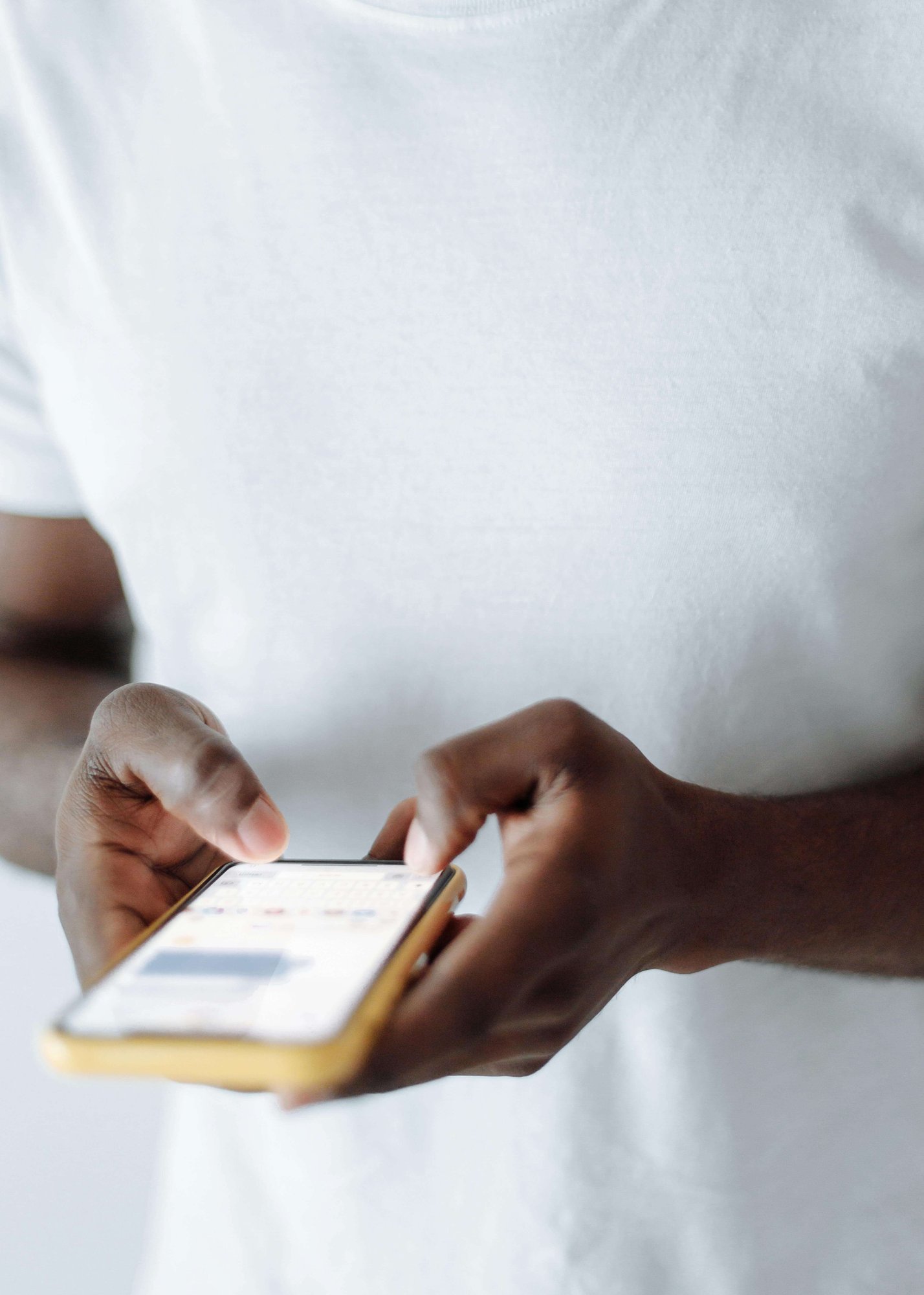 a person checking the peppy app on their phonee